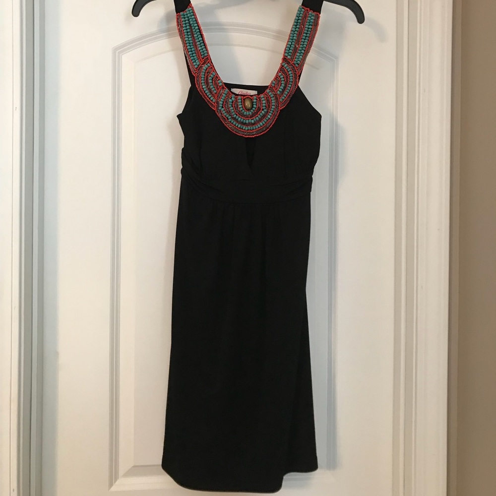 Black candies dress with teal and coral accent